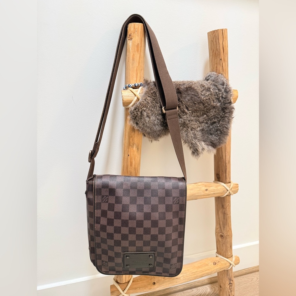 Authentic Louis Vuitton Brown Damier small flap messenger bag.